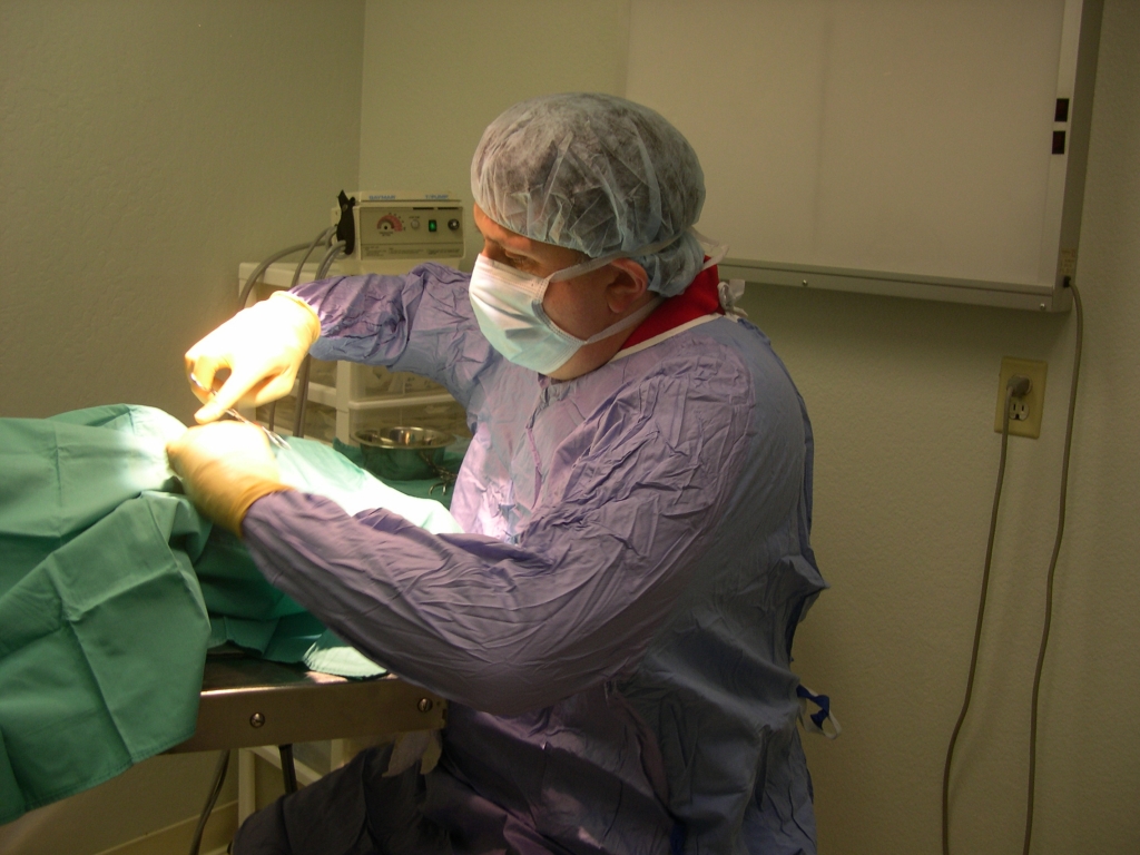 Dr. Downes performs surgery